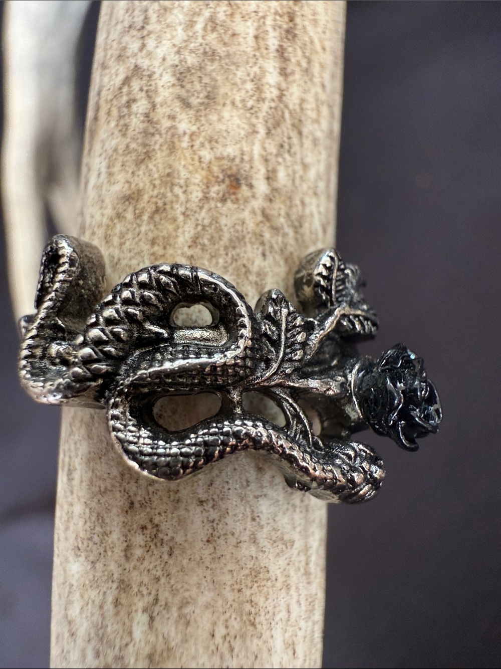 Silver tone metal -Black Oxidized Snake Ring with black Rose Accent